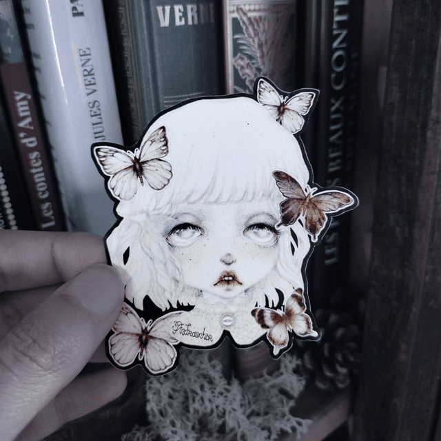 Sticker ~ sad porcelain-skinned doll with butterflies